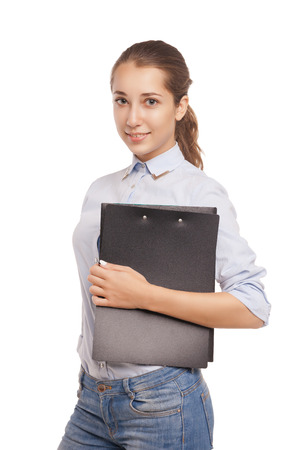 Portrait of smiling business woman with paper folder, isolated on white backgroundの写真素材