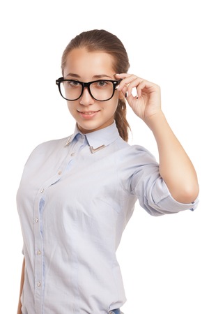 Cute young business woman with glasses isolated over white backgroundの写真素材