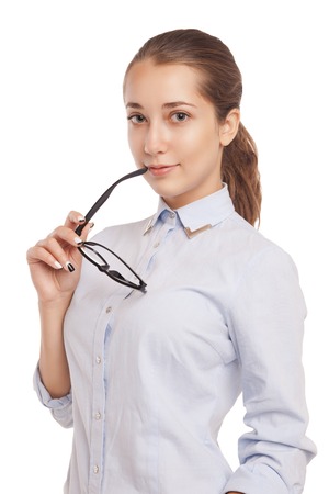 Cute young business woman with glasses isolated over white backgroundの写真素材