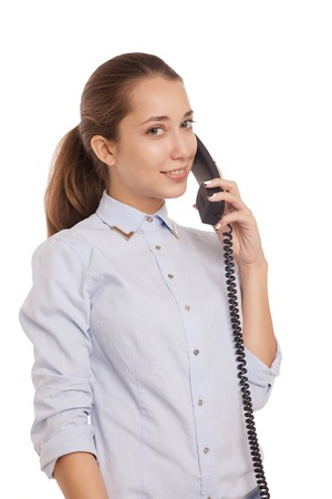Portrait of smiling business woman phone talking, isolated on white backgroundの写真素材