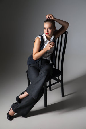 Mafiosi woman with  brandy glass. Fashion photo. Retro styleの写真素材