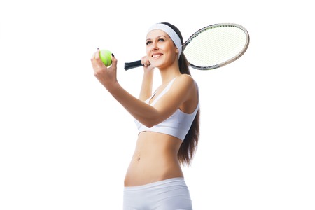 Tennis player  preparing to serve. Isolated over white background.の写真素材