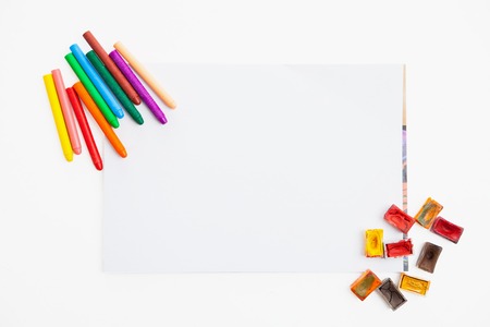 Colour pencils and watercolor  on paper blank isolated on white background close upの写真素材