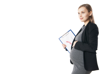 Smiling pregnant businesswoman with folder. Isolated over white backgroundの写真素材