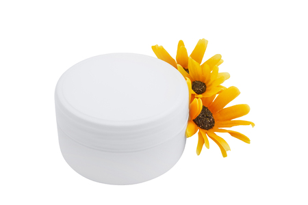 Cosmetic cream and flowers, spa, skincare or haircare or bodycare, isolated on whiteの写真素材
