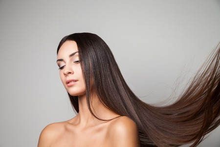 Woman with flying hairの写真素材