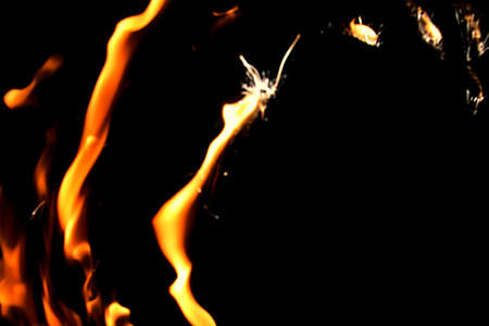Fire flames on black backgroundの写真素材