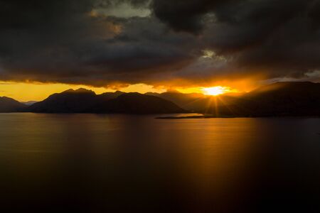 Drone footage of a stormy sunset over Loch Linnhe, from North Ballachulish, Fort William, Scotland.の写真素材