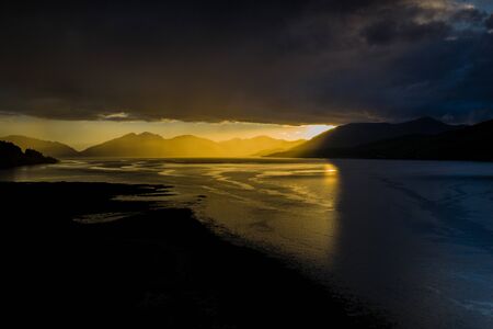 Drone footage of a stormy sunset over Loch Linnhe, from North Ballachulish, Fort William, Scotland.の写真素材