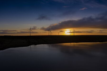 Sunrise over Ovenden Moor Wind Farm, West Yorkshireの写真素材