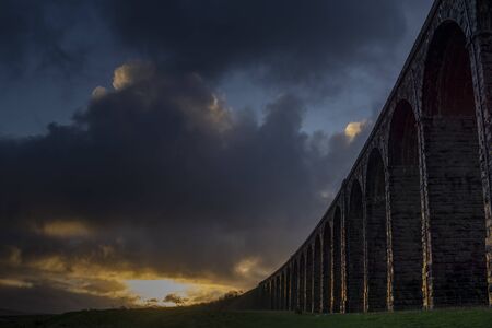 Sunset over Iconic Yorkshire Landmark Ribblehead Viaductの写真素材