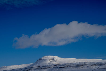 Ingleborough Mountain one of the Yorkshire Three Peaks covered in snow, Ingleborough, North...