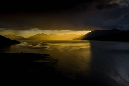 Drone footage of a stormy sunset over Loch Linnhe, from North Ballachulish, Fort William, Scotland.の写真素材