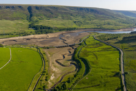 Aerial view of a dramatically low Woodhead Reservoir during drought conditions, The reservoir, part...