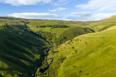 Drone aerial view of valleys near Kettlewell in the Yorkshire Dales.の写真素材