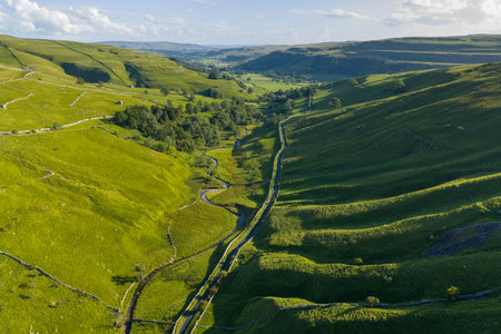 Drone aerial view of valleys near Kettlewell in the Yorkshire Dales.の写真素材