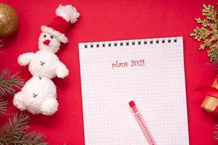 Christmas wish list, notepad on red background, to-do list, holiday moodの写真素材