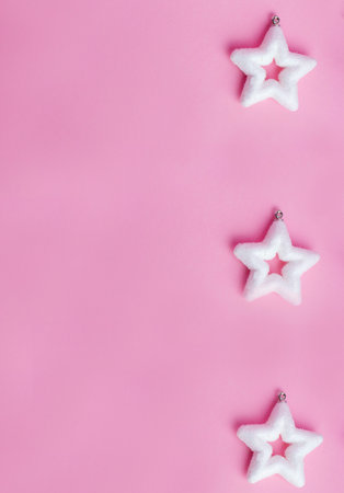 white star on pink background vertical banner, romantic tender cardの写真素材