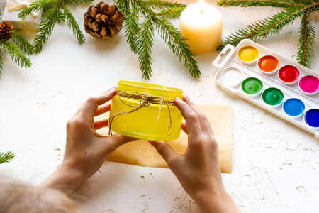 making a Christmas candlestick with your own hands from gouache and a glass jar step by step, step 6の写真素材