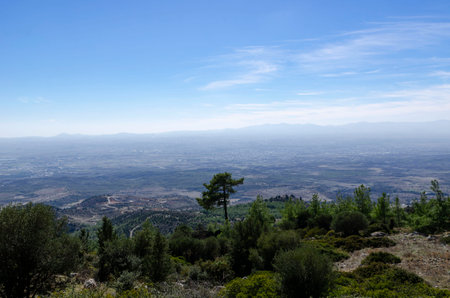 view of the valley from the top of the mountains in Cyprus in the foreground a forest on the slope of the mountainsの写真素材