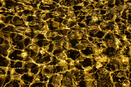 great background whimsical patterns on the sand across the water horizontal orientation good for photo wallpaperの写真素材