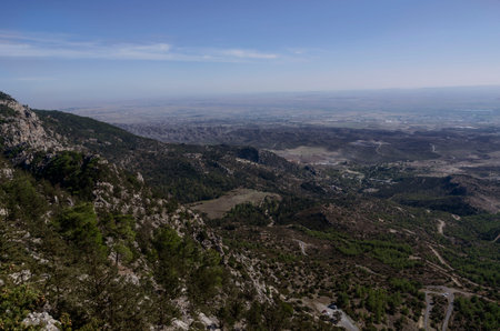 View of the valley from the top of the mountains in Cyprus on a clear sunny day.の写真素材