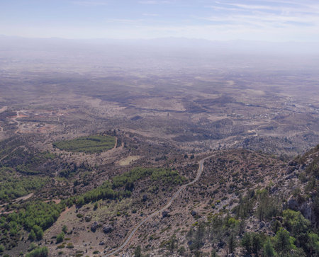 View of the valley from the top of the mountains in Cyprus on a clear sunny day.の写真素材