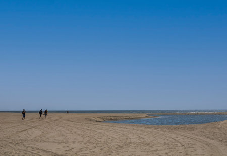 USA California Los Angeles Santa Monica District May 13, 2023 Pacific coast people wander along the...