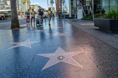 America California Hollywood August 20, 2025 Famous Chinese Theater in Hollywood with street traffic, visitors and historic cinema architecture at daytimeのeditorial素材