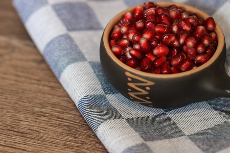 Bowl with pomegranate seedsの写真素材