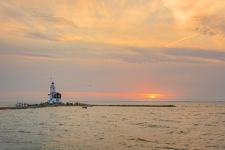 The Paard van Marken lighthouse, translated as Horse of Marken, is a famous Dutch lighthouse located at the Ijsselmeer at the village called Marken.の写真素材