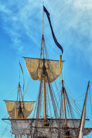 Sailboat and the match against the sky.の写真素材