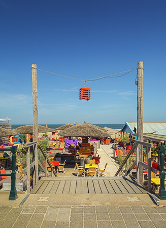 Scheveningen, The Netherlands - May 13, 2016: The terrace of a beachclub on the boulevard in Scheveningen.のeditorial素材