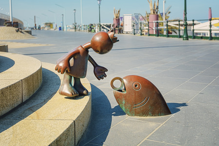 May 13, 2016 on the boulevard of Scheveningen, The Netherlands, a group of statues called 'statues of the sea'.のeditorial素材
