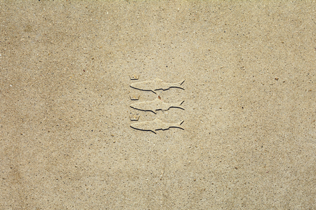 The weapon of Scheveningen in a concrete sidewalk tile.の写真素材