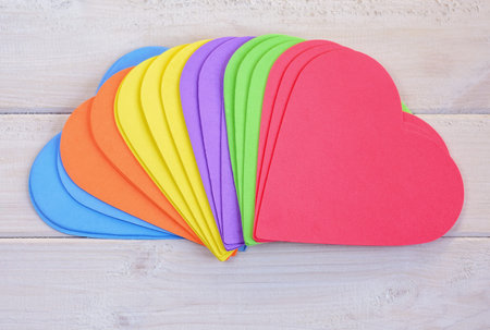 Heart of love on a white wooden background.