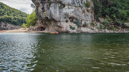 Kayak on the river mountain in the background.の写真素材