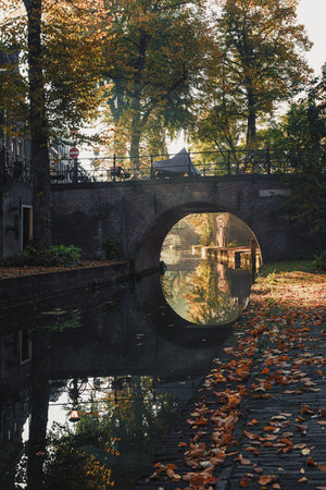 The Nieuwegracht with its arched bridges in the old town of Utrecht.の写真素材