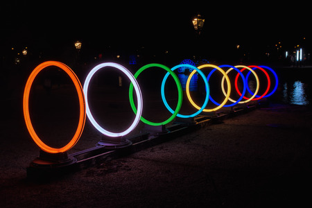Amsterdam, Netherlands - December 18, 2015: Light Festival Amsterdam, hypnotic circles made of neon light.のeditorial素材