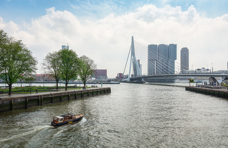 Rotterdam, Netherlands - May 26, 2016: The bridge Erasmus Bridge spans the river Nieuwe Maas and is 284 meters long and is also known as swan bridgeのeditorial素材