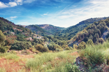 Panorama of a village in a valley of the ArdÃ¨che mountains in Franceの写真素材