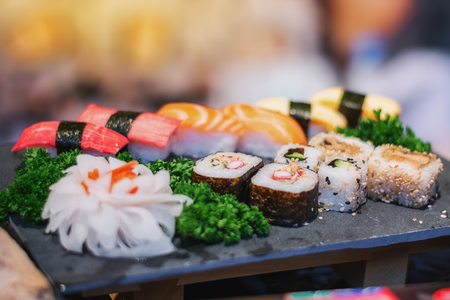Plate with delicious Sushi dishes on the food festival in Utrecht in Netherlandsの写真素材