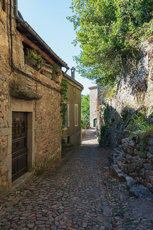 The narrow street in the picturesque village of Labeaume in the Ardeche region of Franceの写真素材