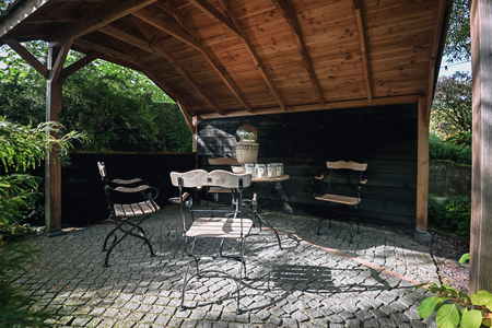 Appeltern, Netherlands, September 29, 2017:  gazebo furnished with a decorative garden setのeditorial素材
