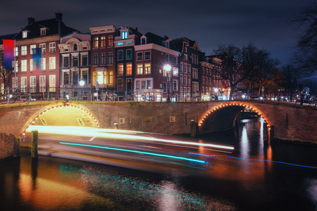 Amsterdam, The Netherlands, December 26, 2017: Old bridges across the canals Herengracht and Reguliersgracht in the old town of Amsterdamのeditorial素材