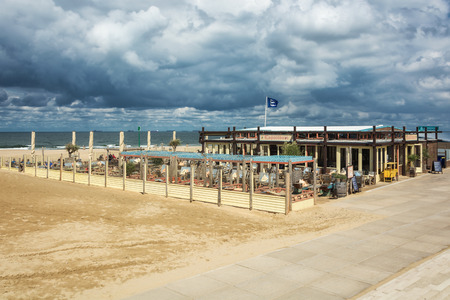 Scheveningen, The Netherlands, August 9, 2017: The terrace of a Beach club along the boulevard.のeditorial素材