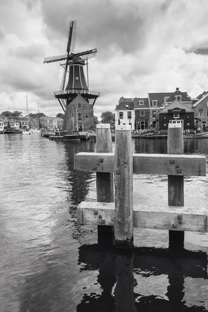Haarlem, Netherlands, August 5, 2016:  The eight-sided smock mill De Adriaan on the river De Spaarne in Haarlemのeditorial素材