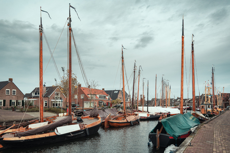 Spakenburg, Netherlands, November 9, 2015:  Moored ships in the harbor of the former fishing village Spakenburg in the Netherlandsのeditorial素材
