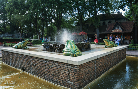 Kaatsheuvel, Netherlands, August 19 , 2017: Fountain with water spitting frogs in the fairytale forest in the theme park Efteling in the Netherlandsのeditorial素材