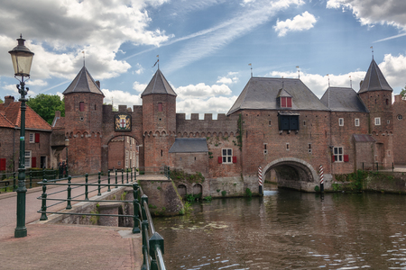 The canal Eem with in the background the medieval gate The Koppelpoort in the city of Amersfoort in The Netherlandsのeditorial素材